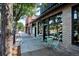 Charming commercial building with brick facade and inviting outdoor seating area near a vibrant street at 2731 W 32Nd Ave, Denver, CO 80211