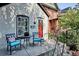 Inviting front porch with a sitting area, perfect for relaxing outdoors at 2731 W 32Nd Ave, Denver, CO 80211