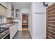 Bright kitchen featuring stainless steel appliances and a sliding door at 2731 W 32Nd Ave, Denver, CO 80211