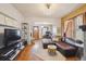 Spacious living room with hardwood floors, stylish furniture, and an open layout at 2731 W 32Nd Ave, Denver, CO 80211