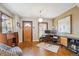 Inviting living area featuring hardwood floors, vintage accents, and a functional workspace at 2731 W 32Nd Ave, Denver, CO 80211
