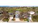 Aerial view of home nestled in neighborhood near a park, offering a serene environment with mountain views at 11525 Eaton Ct, Westminster, CO 80020