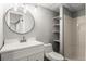 Bathroom featuring a new vanity, tiling and modern fixtures at 11525 Eaton Ct, Westminster, CO 80020