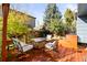 Backyard deck with comfortable seating, a custom firepit table and privacy at 11525 Eaton Ct, Westminster, CO 80020