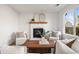 Cozy living room with fireplace, modern decor, and comfortable seating arrangement at 11525 Eaton Ct, Westminster, CO 80020