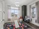 Bright bedroom featuring a floral rug, natural light, and play equipment, perfect for  at 9446 Quintero St, Commerce City, CO 80022