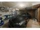 Garage with a car, bicycle, and storage, offering convenience and functionality at 1818 S Quebec Way # 11-8, Denver, CO 80231