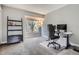 Bright office space featuring a window, desk and shelving at 1818 S Quebec Way # 11-8, Denver, CO 80231
