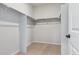 Walk-in closet with shelving and carpeted floor at 14123 Deertrack Ln, Parker, CO 80134