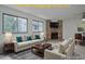 Bright living room features a fireplace and plenty of natural light at 4134 S Fraser Way # E, Aurora, CO 80014