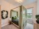 Charming bedroom features a canopy bed, fairy lights, natural light and modern decor at 5535 W 96Th Pl, Westminster, CO 80020