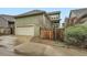 Exterior of the house with a garage and a fence at 5535 W 96Th Pl, Westminster, CO 80020