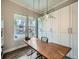 Bright home office with a large desk, hardwood floors, and plenty of natural light, ideal for remote work at 5535 W 96Th Pl, Westminster, CO 80020