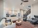 Open concept floorplan combines kitchen, living area, and staircase at 5535 W 96Th Pl, Westminster, CO 80020