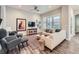 Cozy living room features a comfortable sofa, decorative accents, and a large window for natural light at 5535 W 96Th Pl, Westminster, CO 80020