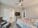 Cozy main bedroom includes a TV, dresser, and neutral tones at 5535 W 96Th Pl, Westminster, CO 80020