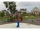 Fun playground with slides and swings, located near well-maintained homes at 5535 W 96Th Pl, Westminster, CO 80020