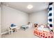 Charming ' bedroom with twin beds and a playful decor at 3722 Sandy Vista Trl, Castle Rock, CO 80104