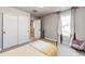 Neutral bedroom with carpet, white double door closet, and natural light at 3722 Sandy Vista Trl, Castle Rock, CO 80104