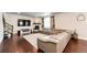 Spacious living room with decorative fireplace and comfortable sectional sofa at 3722 Sandy Vista Trl, Castle Rock, CO 80104