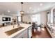Bright living area features an open floor plan with lots of natural light and fireplace at 3722 Sandy Vista Trl, Castle Rock, CO 80104