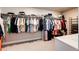 Spacious walk-in closet with ample storage and a variety of clothing at 3722 Sandy Vista Trl, Castle Rock, CO 80104