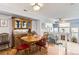 Traditional dining room with hardwood floors and a large hutch at 8199 Welby Rd # 3102, Denver, CO 80229