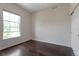 Cozy bedroom featuring a window for natural light and closet for storage at 24733 E Park Crescent Dr, Aurora, CO 80016