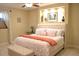 Serene bedroom featuring a decorative niche and plush bedding at 24733 E Park Crescent Dr, Aurora, CO 80016