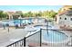 Resort-style community pool area with a ' splash pool, ample seating, and well-maintained landscaping at 24733 E Park Crescent Dr, Aurora, CO 80016