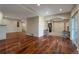 Open-concept living area with hardwood floors and natural light throughout at 24733 E Park Crescent Dr, Aurora, CO 80016