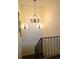 Stylish stairway with modern lighting and decorative wall panels at 24733 E Park Crescent Dr, Aurora, CO 80016