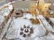 Aerial view of backyard with fire pit and seating area at 10976 W 55Th Ln, Arvada, CO 80002