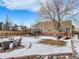 Backyard with fire pit, patio, and gazebo in winter at 10976 W 55Th Ln, Arvada, CO 80002