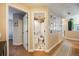 Small half bathroom with toilet and pedestal sink at 10976 W 55Th Ln, Arvada, CO 80002