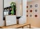 Entryway with console table, mirror, and wall art at 10976 W 55Th Ln, Arvada, CO 80002