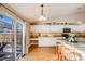 Bright kitchen, granite counters, and white cabinets at 10976 W 55Th Ln, Arvada, CO 80002