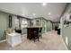 Basement bar area featuring dark wood, ample storage and display areas at 10221 Nucla St, Commerce City, CO 80022