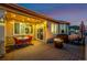 Cozy deck features outdoor seating, a grill, and string lights creating an inviting atmosphere for relaxing evenings at 10221 Nucla St, Commerce City, CO 80022