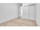 Spacious bedroom with sleek flooring, a large closet, and abundant natural light at 1491 S York St, Denver, CO 80210