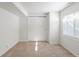 Bright bedroom with closet and window. Perfect for your dream sanctuary at 20550 E Lake Cir, Centennial, CO 80016