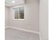 Finished basement room with natural light, carpet flooring, and ample space for various uses at 1426 Swan Peter Dr, Berthoud, CO 80513