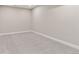 Finished basement room with carpet flooring, ample space, and neutral paint for multiple uses at 1426 Swan Peter Dr, Berthoud, CO 80513