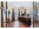 Bright home office features hardwood floors and French doors at 24237 E Glasgow Cir, Aurora, CO 80016