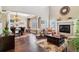 Open living room and dining area with hardwood floors at 24237 E Glasgow Cir, Aurora, CO 80016