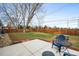 Relaxing backyard with a concrete patio and patio furniture at 9395 W Kentucky Ave, Lakewood, CO 80226