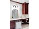 Bathroom vanity with seating, bright lighting, and storage space at 2209 Green Oaks Ln, Greenwood Village, CO 80121