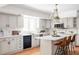 Modern kitchen featuring white cabinets and sleek countertops at 2209 Green Oaks Ln, Greenwood Village, CO 80121