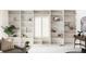 Living room featuring custom built-in shelving and natural light at 2209 Green Oaks Ln, Greenwood Village, CO 80121