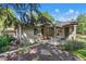 A charming backyard features a swing, dining area, and well-maintained garden for outdoor enjoyment at 801 S Steele St, Denver, CO 80209